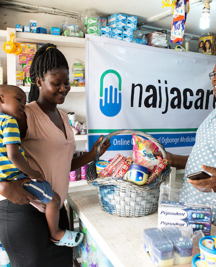 Woman buying from a NaijaCare PPMV